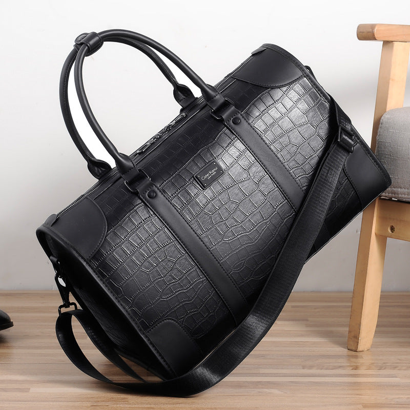 The Élite Crest Compact Duffle