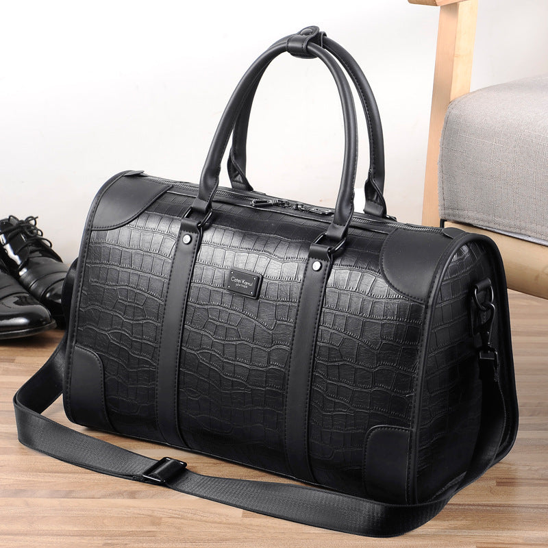 The Élite Crest Compact Duffle