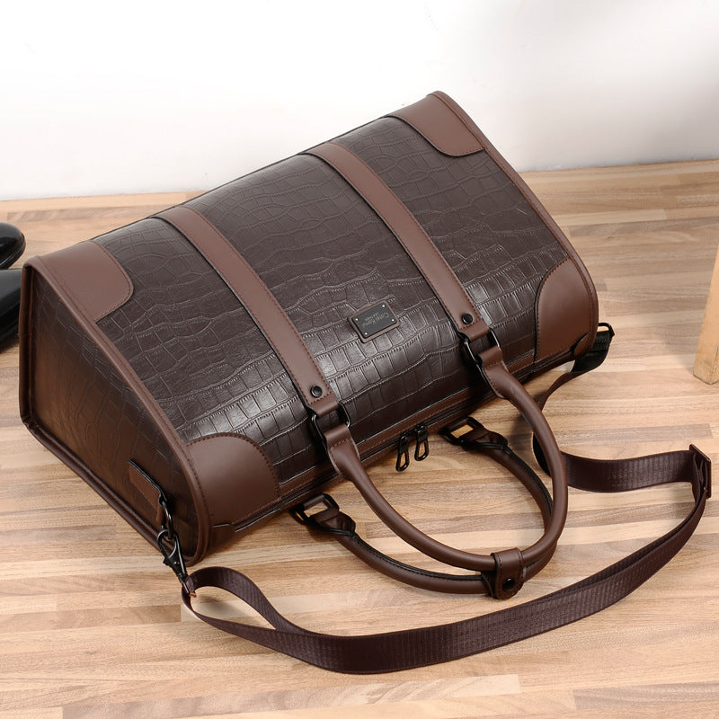 The Élite Crest Compact Duffle